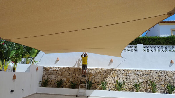 Vela a medida, toldo