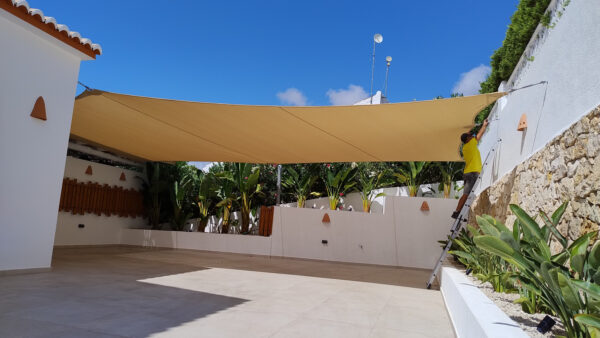 Vela a medida, toldo